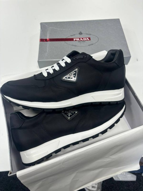 Prada Milano Men's Prax 01 Re-Nylon Sneakers Replica Sale UK	Men First Copy Designer Sneaker Man Cheap Price Fake Reps Shoes 1st Copies Fakes Rep Trainers 1:1 Luxury Brand Logo Trainer 1 to 1 Runners Designer Shoe AAA Duplicate Black