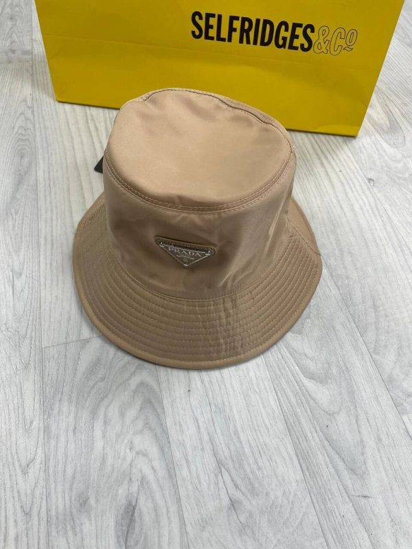 Prada Milano Men Women Re-Nylon Bucket Hats Reps AAA Sale UK	Man Woman First Copy Replica Winter Wool Hat Men's Women's Cheap Price Designer Fake Rep 1st Copies Fashion Cap 1:1 Luxury Original Brand Logo 1 to 1 Fakes Duplicate Beige 