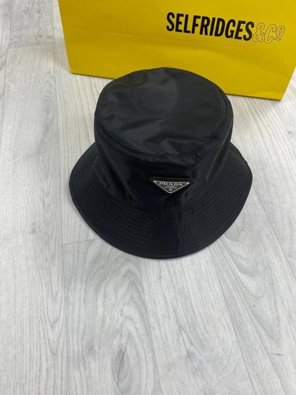 Prada Milano Men Women Re-Nylon Bucket Hats Reps AAA Sale UK	Man Woman First Copy Replica Winter Wool Hat Men's Women's Cheap Price Designer Fake Rep 1st Copies Fashion Cap 1:1 Luxury Original Brand Logo 1 to 1 Fakes Duplicate Black