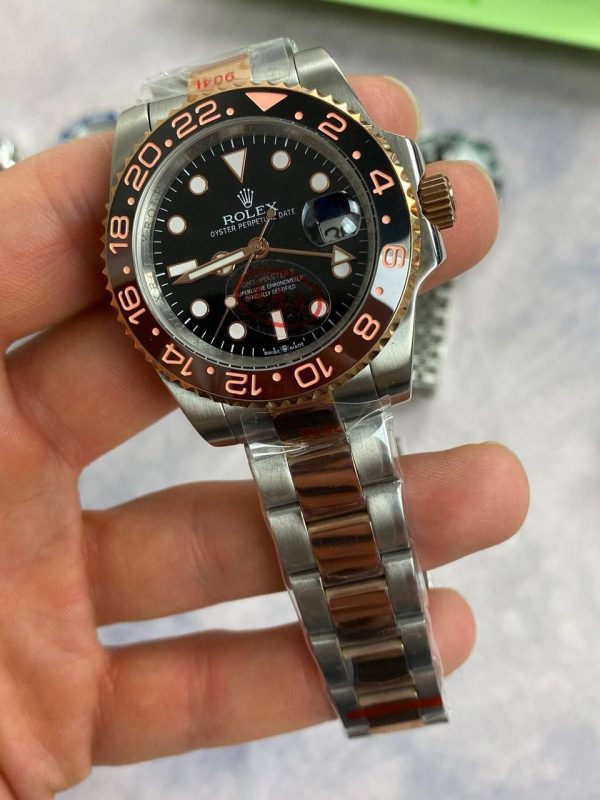 Rolex GMT Master II Black Dial Watch in Two Tone Chain Strap with Gold Bezel