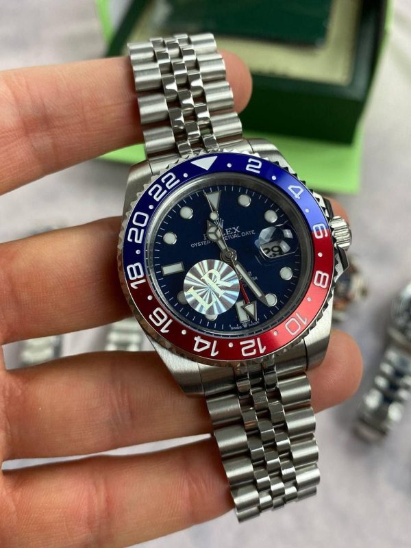 Rolex GMT Master II Black Dial Watch in Silver Chain Strap with Red & Blue Bezel